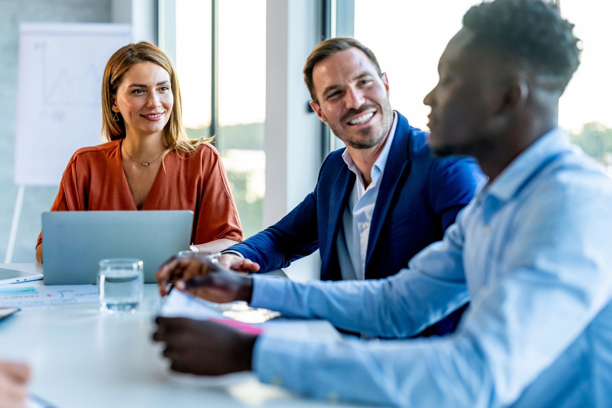 Leadership team collaborating in a corporate office