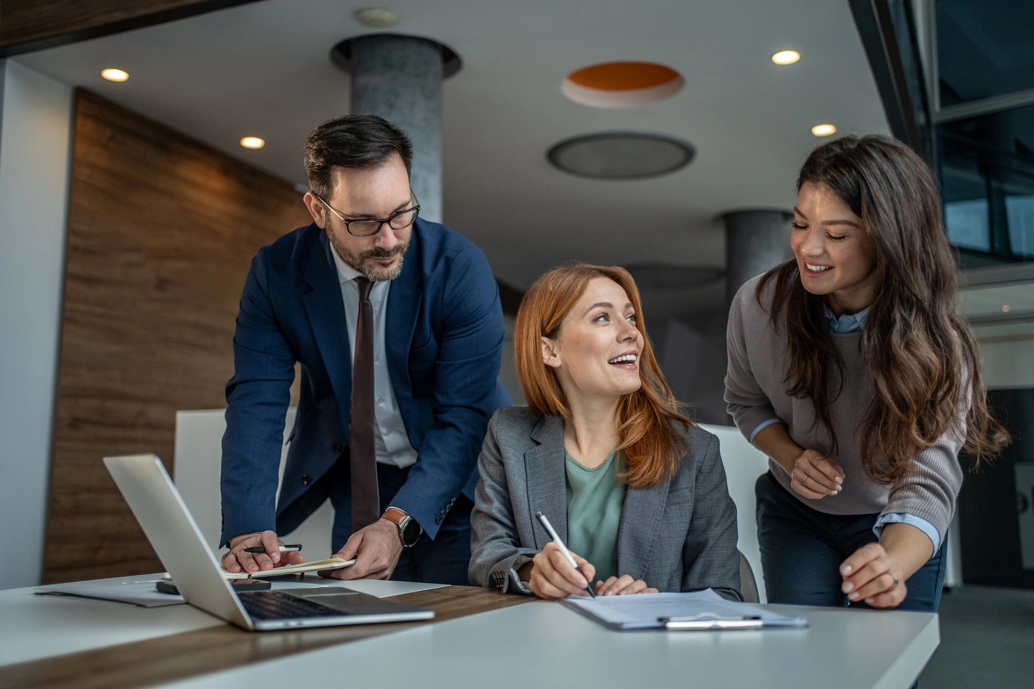 Business colleagues collaborating on strategy in a modern office