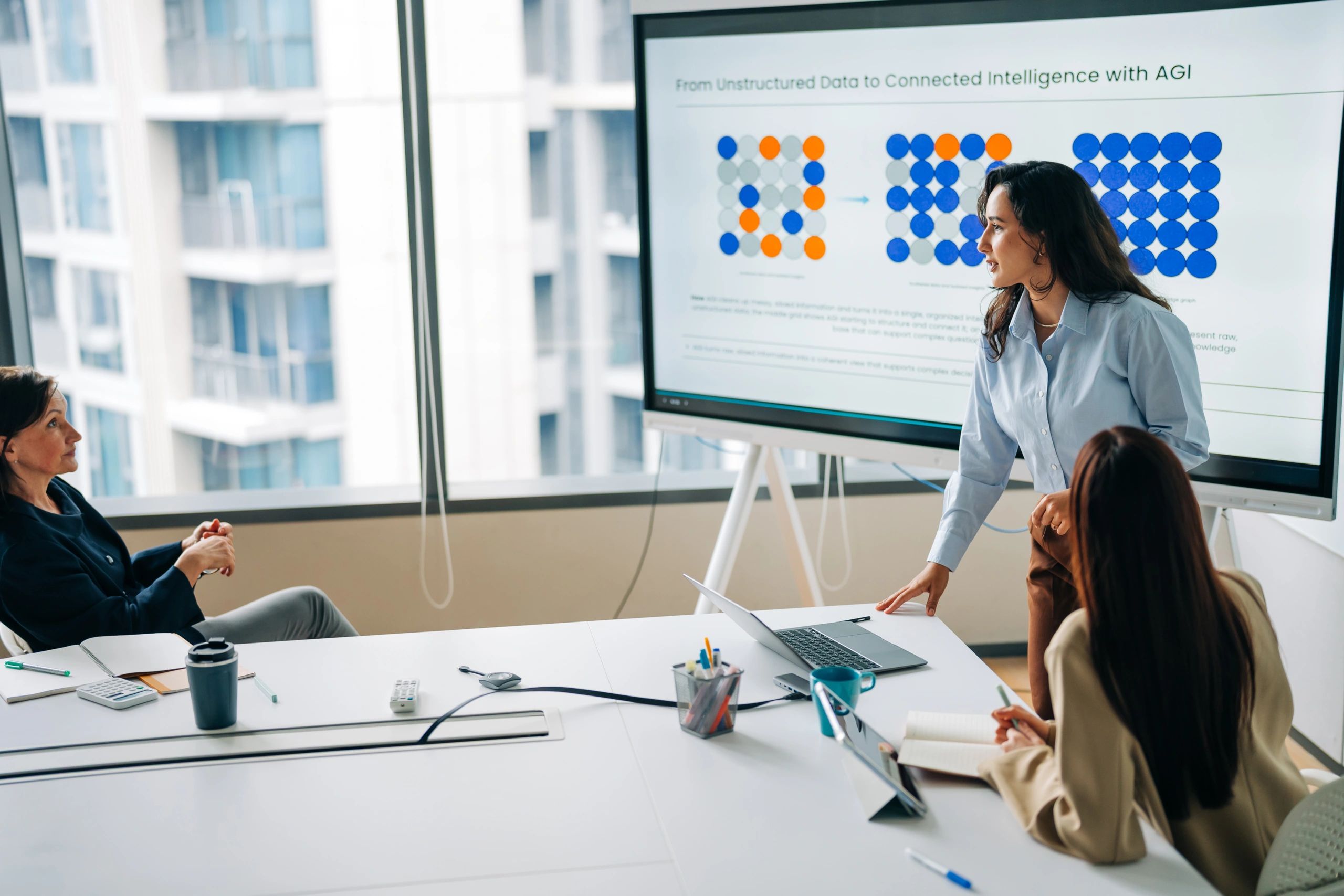 Business team attending artificial intelligence strategy presentation
